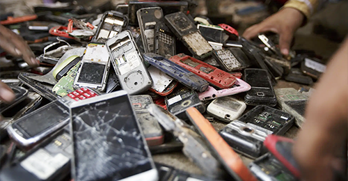 We’re drowning in electronic waste because we buy new devices too soon and don't recycle old stuff fast enough