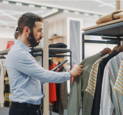 Snapshot of a Person Using a Mobile Device in a Retail Store